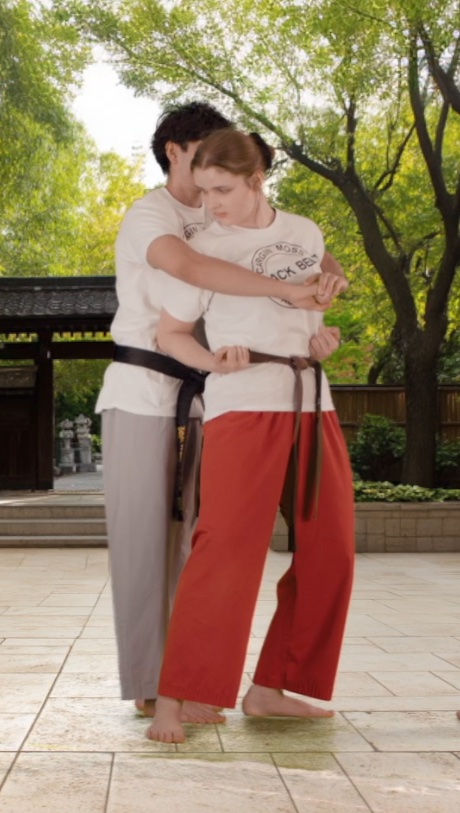 bear hug self defence escape technique from being-grabbed-from-behind-with-an-elbow